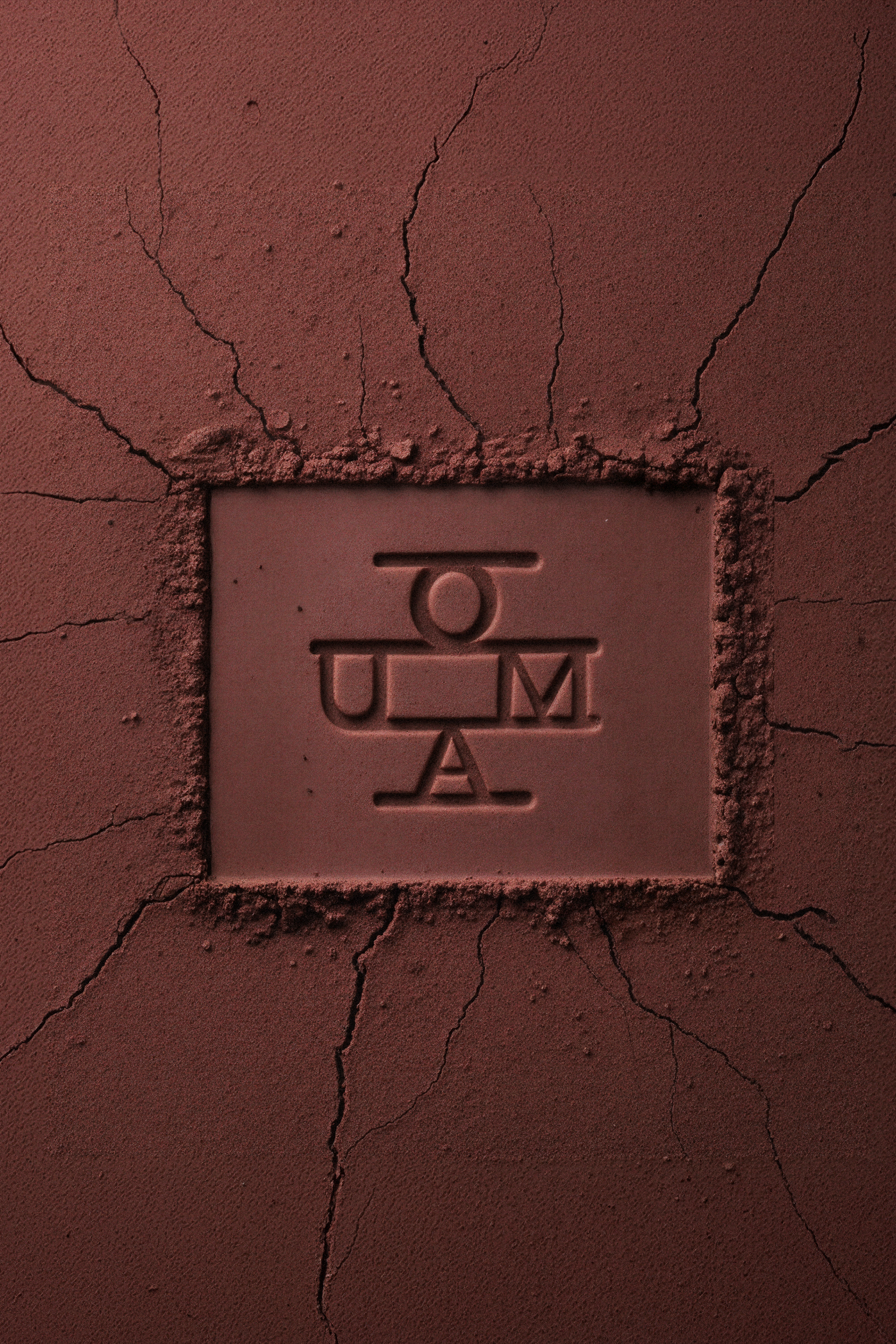 OUMA Brandmark Red Clay Logo