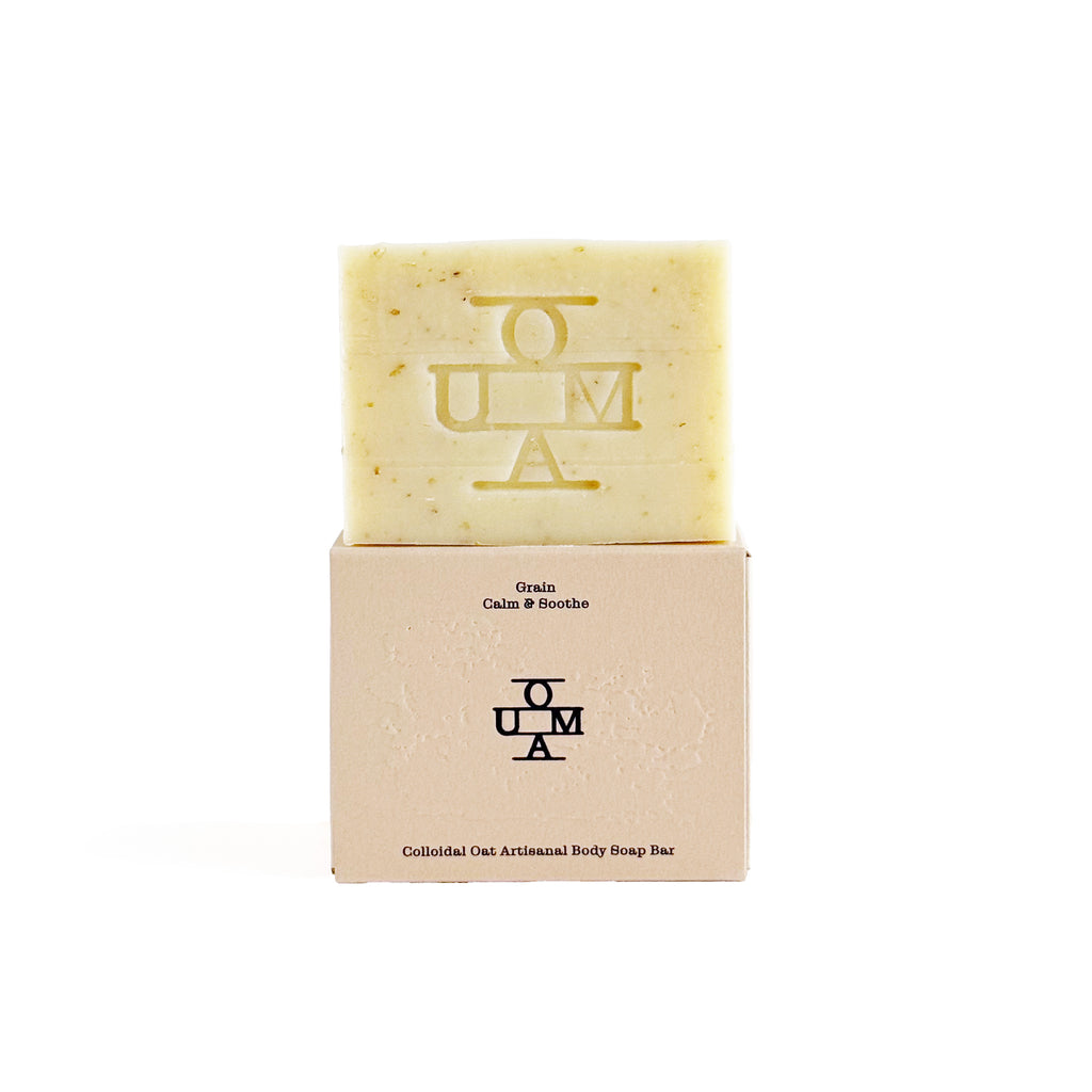 No. 001 Grain soap bar with packaging and 'OUMA' branding on a white background