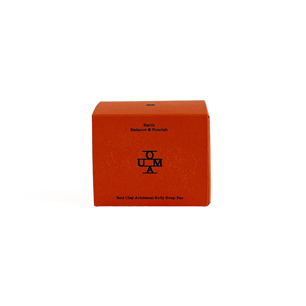 No. 002 Earth soap bar packaging with 'OUMA' branding on a white background